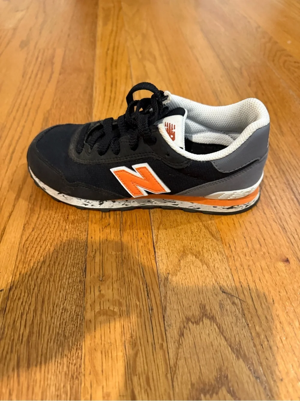 New Balance Kids Black and Orange Low-Top Sneakers
